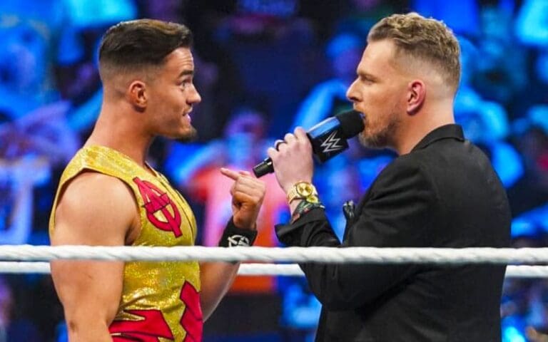 Pat McAfee Unveils Paul Heyman's Influence on Promo Clash with Austin Theory